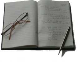 Notebook, pen and spectacles